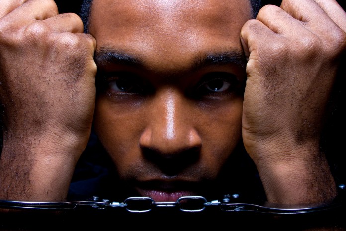 Close Up of a Black Man in Hand Cuffs